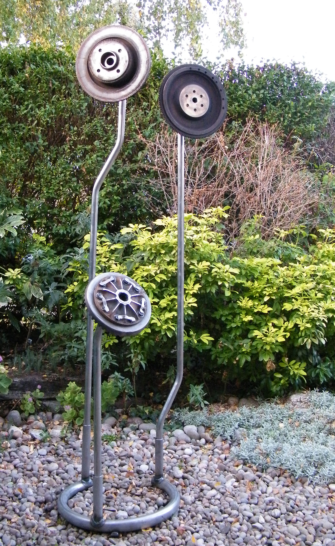 Welded metal sculpture - created from found objects, car parts and metal tubing
