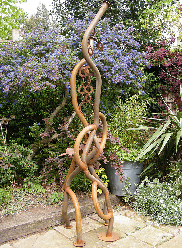 Serpetnine sculpture created from recycled metal